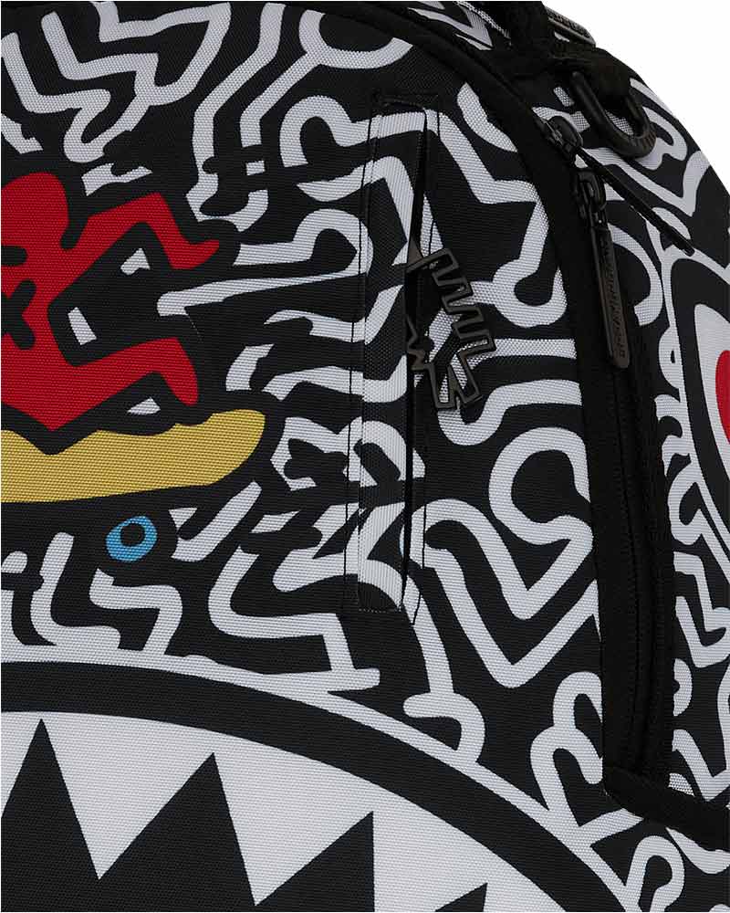 Mochila-Sprayground-Keith-Harring-Skater-Shark-Dlxsr-Unissex