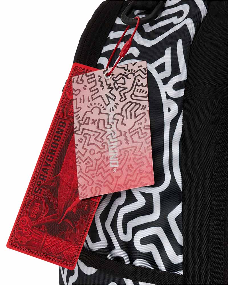 Mochila-Sprayground-Keith-Harring-Skater-Shark-Dlxsr-Unissex